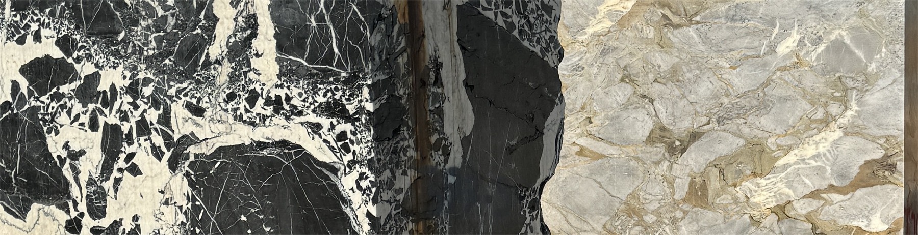 Close-up of three marble slabs.