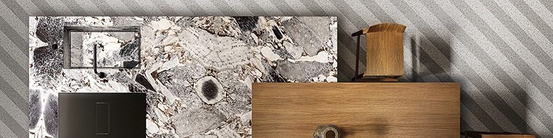 Closeup of white marble countertop and wood